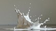 A splash created by pouring milk or another white liquid