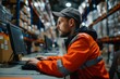 Collaborative Work: Warehouseman and Engineer Ensuring Smooth Delivery Process with Computer