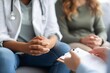 © LifeMedia - An empathetic healthcare professional offering comfort and support to a patient during a medical consultation