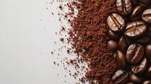 Captivating Close-up Of Coffee Grounds And Beans In Mid-air Sprinkle