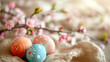 Easter still life with colorful eggs and sakura branches close-up