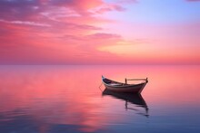 The Tranquil Beauty Of A Calm Sea At Sunrise