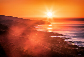 Wall Mural - The view of the sunrise from the ocean from the Marriner's lookout in the Great Ocean Road