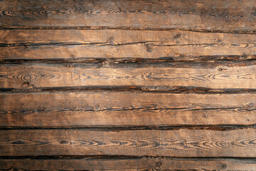 Wall Mural - Old wooden logs wall background. Rustic wood surface