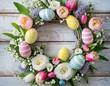 Osterkranz mit Ostereiern und Frühlingsblumen