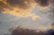 © APIAPIJAH - golden light, blue sky and black cloud pattern. shade of dramatic and fantasy. dusk scene. evening sky. abstract and nature background.