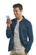 © Bharat/peopleimages.com - Smile, typing and man with phone for social media, internet and communication isolated on a transparent png background. Scroll, smartphone and happy person on mobile app, technology and reading email