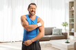 © Ljupco Smokovski - Male athlete in pain holding his inflamed shoulder