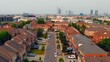 Drone view over typical North American houses, quintessence of family home in suburban areas. Perfect for showcasing family home lifestyle where Americans cherish family values. American suburban life