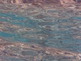 Sticker - Water surface with reflections from the rays of sunlight