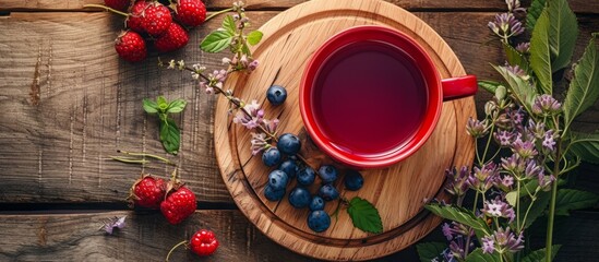 Poster - A blend of natural foods, blueberries, and raspberries served in a rustic way on a wooden cutting board, perfect for enjoying with a cup of tea