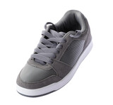 Fototapeta Na ścianę - Grey sneakers isolated on white background. New footwear minimal casual style. with clipping path