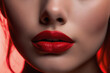 The red hue of her red lipstick adorns her lips like a precious organ, highlighting their allure in a captivating closeup