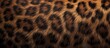 Brown leopard pattern on natural fur, a close up of a terrestrial animals distinct print on woodlike material, resembling the wild essence of wildlife