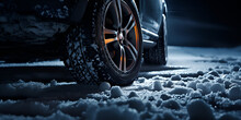Winter tire car on snow road fitting for cars snowy mountains highway blurred background