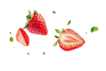 strawberry with half slices falling or floating in the air with green leaves isolated on background,