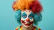 Portrait of a clown with bright makeup, a multicolored wig, and a joyful expression