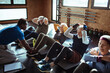 © Davor - Group of senior people working out with trainer in gym