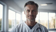 Confident Mid-Age Swedish Male Doctor or Nurse in Clinic Outfit Standing in Modern White Hospital, Looking at Camera, Professional Medical Portrait, Copy Space, Design Template, Healthcare Concept
