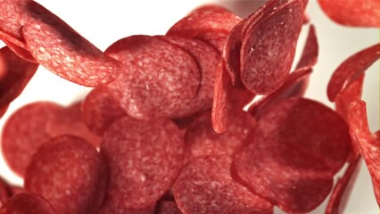 Wall Mural - Sliced salami flies up and falls down. Filmed on a high-speed camera at 1000 fps. High quality FullHD footage