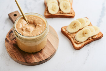 Wall Mural - Creamy and smooth peanut butter in jar