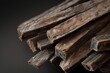 Close up view of oudh sticks on black background used for burning as incense or making Arabian oud oils or bakhoor