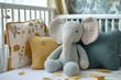 Cute handmade crochet elephant toy with crib decor and pillows