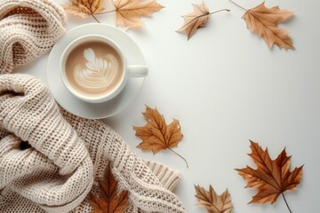 Sticker - Coffee cup autumn leaves knitted blanket on white Overhead view