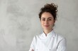 © LimeSky - Female chef portrait on pale grey backdrop