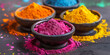 Vibrant Holi Powder Colors in Bowls. Assorted bright Holi powder dyes in traditional bowls, festival colors.