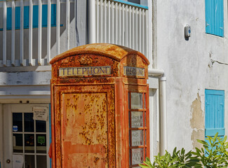 Sticker - Old Red Rusty Phone Booth on Grand Turk