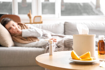 Canvas Print - Medications with lemon on table of sick little boy at home, closeup