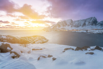 Wall Mural - norway lofoten beach red houses clouds in the air sunset light and colors