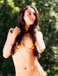 Young Woman Outdoors In Orange Bikini Summer