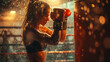 A Thai beautiful Female boxer hits a huge punching bag at a boxing studio. Woman Muay Thai boxer training hard with sweating body and water splashing drops