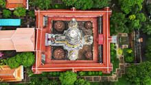 Top View Of The Main Prang Of Wat Mahathat Worawihan. It Is An Architecture Built In The 18th Century , Consisting Of A Main Prang And Three Subordinate Prangs On The Same Base. Located At  Thailand.