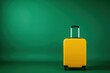 a yellow suitcase is sitting on a green surface