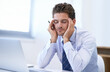 © Mariusz S/peopleimages.com - Headache, pain and business man with stress, fatigue and anxiety for overwork in office. Migraine, depression and professional massage temples for burnout, sick and tired agent frustrated by laptop