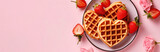 Fototapeta Mapy - Plate with heart-shaped waffles and strawberries on a pink background. Mothers Day breakfast concept. Generative AI