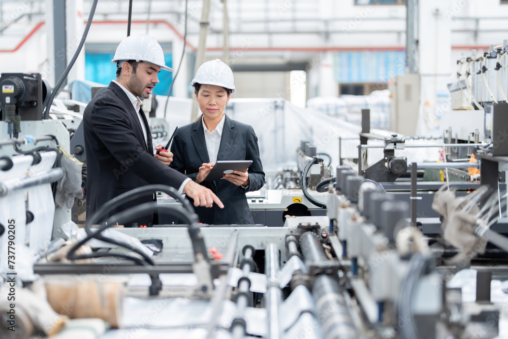 European male engineer and Asian female senior official Design ...