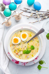 Poster - Homemade polish Easter soup with addition of sausage, hard boiled egg and vegetables in a bowl