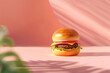 3d rendering of an appetizing hamburger on a pastel background with the shadow of palm leaves