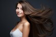 © Ilia K - Beautiful young woman with loose brown hair. Healthy hair care and beauty concept