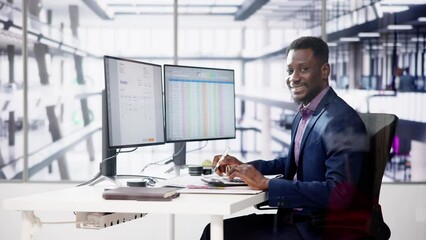 Data Analyst African Man Using Spreadsheet