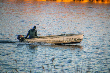 Wall Mural - Man in a boat