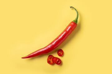 Wall Mural - Red hot chili peppers on yellow background