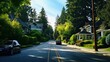 Neighbourhood of luxury houses with street road, big trees and nice landscape in Vancouver, Canada. Blue sky.
