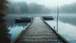 A weathered wooden dock stretching out into a tranquil lake