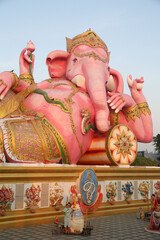 Wall Mural - Pink Ganesh. Wat Saman Rattanaram Temple: Buddhist temple in Chachoengsao Province, Thailand. Religious traditional national Thai architecture. Beautiful landmark, architectural monument. Tourist kid