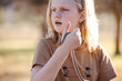 © Austockphoto - Pre-teen adolescent boy holding pet children's python snake